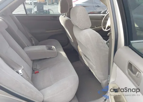 2003 Toyota Camry Le z USA, uszkodzony, nr VIN 4T1BE32K73U223669